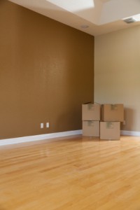 Moving boxes in empty room