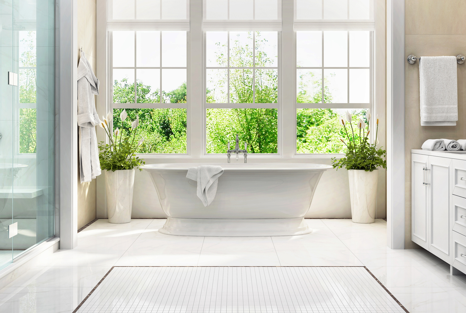 Large white bathroom with bath, large window, shower and two washbasins